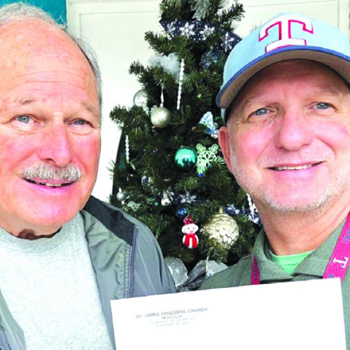 The Holy Smokers of St. James Episcopal Church in La Grange presented a special year end donation of $1,000 to the Serenity Star Recovery Program for Fayette/Bastrop Counties. Pictured from left: Holy Smoker Tom Tracy and Tuf Jones, Serenity Star Program Director.