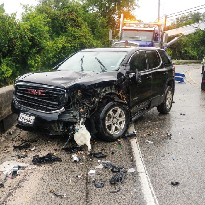 Truck Over the Line Causes Wreck on Bluff During Storm