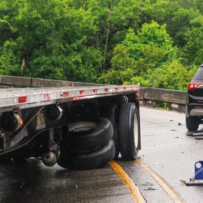 An SUV heading up the Bluff struck the rear trailer wheels of an 18-wheeler that was heading north. According to a report from DPS, the trailer was partially across the center line when the wreck occurred The SUV struck the first rear axle of the trailer. Photos by Andy Behlen
