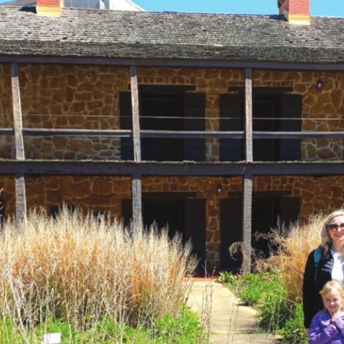 FISD teacher Tara Murphy with students Ainsley and Adeline Murphy at the Old Stone Fort on the SFA campus.