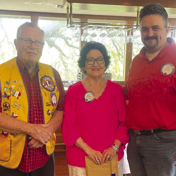 The La Grange Noon Lions welcome their newest member, Sarah Marrou (center). Sarah told the crowd that her mother was a Lions piano player for many years and she is very proud to be a part of a service organization with so much goodwill and history. Pictured with her are Admiral Weldon Koenig (left), her Lions Sponsor, and Craig Moreau (right), La Grange Noon Lions President.