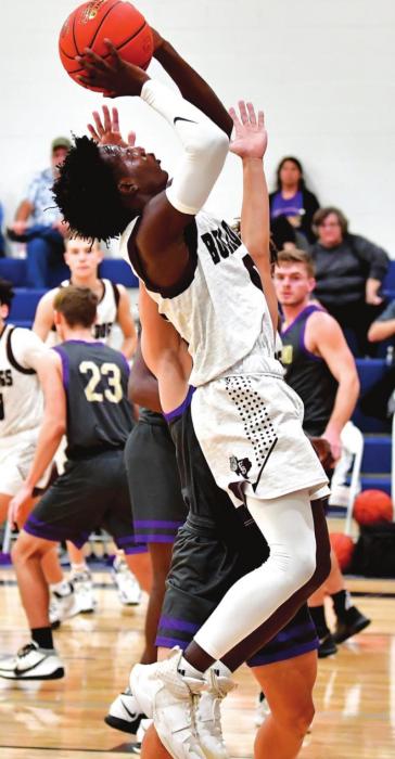 Keyshaun Green shoots for two for The Flatonia Bulldogs in Monday nights Bi-District championship win against the Holland Hornets. Photos by Stephanie Steinhauser