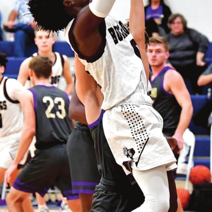 Keyshaun Green shoots for two for The Flatonia Bulldogs in Monday nights Bi-District championship win against the Holland Hornets. Photos by Stephanie Steinhauser