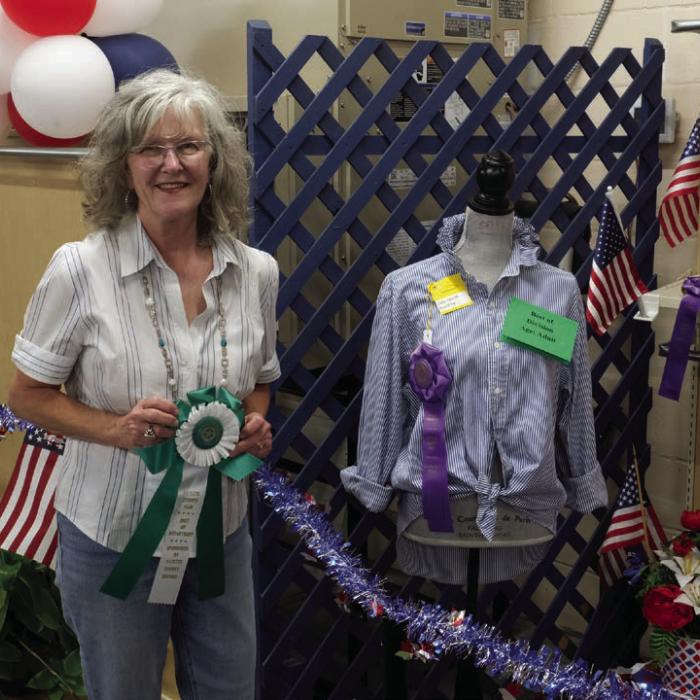 BEST OF THE MACHINE SEWING FABRIC AND FIBERS Best of department in the adult division went to Cathy Gau for a repurposed men’s shirt. Not pictured was Annette Hansen, who won best of department in the senior division.