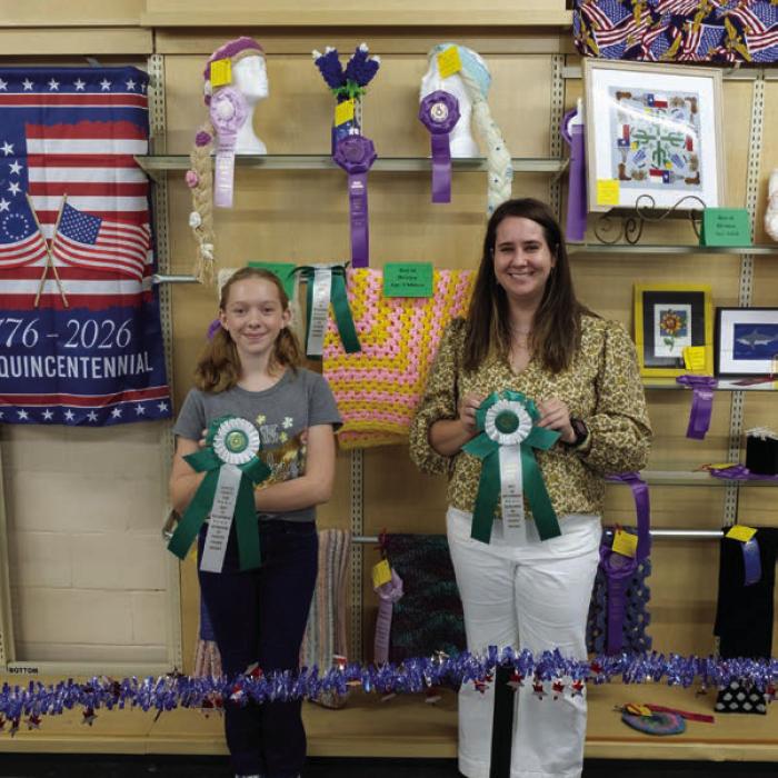 BEST OF THE NEEDLEWORK DEPARTMENT From left, best of department in the child division went to Abbigale Eichler for a pink and yellow crochet afghan; best of department in the adult division went to Jillian Gillie for a Texas Mandala. Not pictured were Emma Koeth, who won best of department in the teen division and Annette Hansen, who won best of department in the senior division.