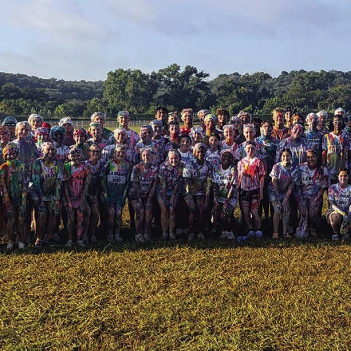 In what has become a tradition, the members of the La Grange High School senior class participated in a massive paint war in the field beside the school prior to boarding the senior float in the Fayette County Fair parade Saturday. Here’s a group photo of those seniors, post-paint war.