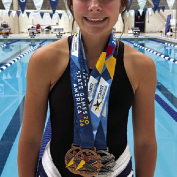 Adysen Janacek led the 1516 girls with an outstanding performance, earning qualifi cation for the 2028 State Games of America with a 3rd-place finish in the 50-yard Breaststroke (36.26). She also finished 4th in the 100-yard Breaststroke (1:23.14), 6th in the 200-yard Individual Medley (2:56.27), and 7th in the 50-yard Freestyle (28.33).