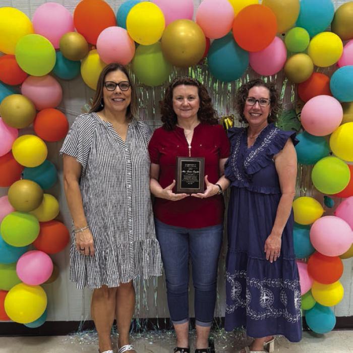 Mrs. Linda Templin, center, has been teaching at Mt. Calvary Preschool for 25 years. She was celebrated by school directors Becky Weikel, left, and Lori Hollek, right.