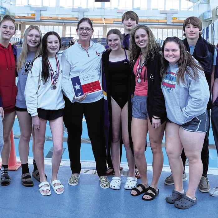 La Grange Swim Coach Gretchen Ledwik wins Best Female Coach of the Meet at Friday’s (January 20, 2023) UIL District 14-4A Swim Meet in San Antonio. La Grange Swim team placed second overall in the meet and will be advancing to Regionals. Pictured from Left to Right: Elena Supak, Quinlyn Landis, Hope Michalke, Eleanor Carey, Coach Gretchen Ledwik, Bailey Swisher, Dalton Landis, Campbell Youens, Avery Koehl, Collin Landis and Spencer Ingram. Photos by Katy Michalke