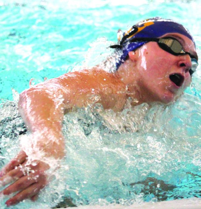 Photos by Katy Michalke La Grange swimming competitors at district, from left to right: Cordale Knapik, Will Bundick and Bailey Swisher.