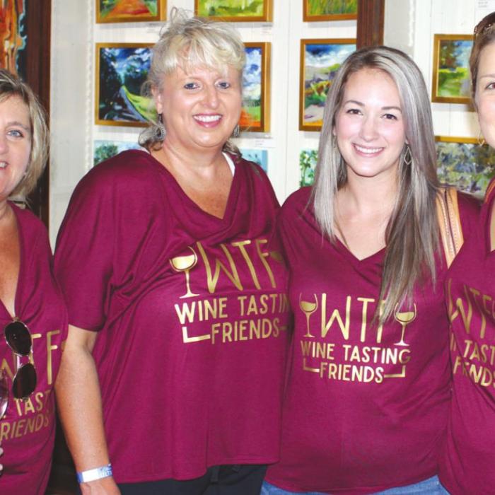 A group of ladies enjoying a previous La Grange Uncorked event.