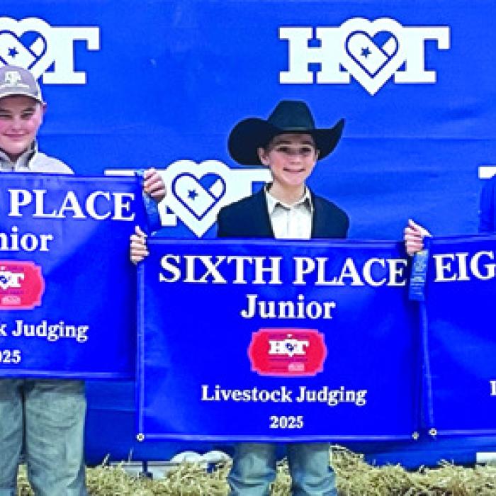 Champion Junior Team: Adalyn Carrales, Abraham McBride, Crockett Guenther, Kaisley Janecka, and Coach Kaci Carrales.