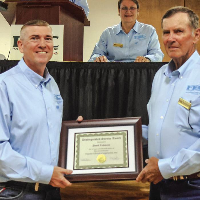 David Lehmann, director of District 1, retired from the board of directors after serving for 45 years. David is pictured at right receiving a distinguished service award from General Manager/ CEO Doug Lambert.