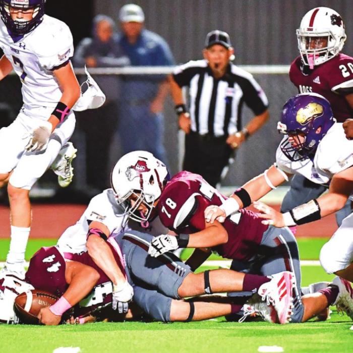 Flatonia’s Gabriel Venegas (#44) recovers a Shiner fumble in Friday night’s district matchup. Photo by Stephanie Steinhauser