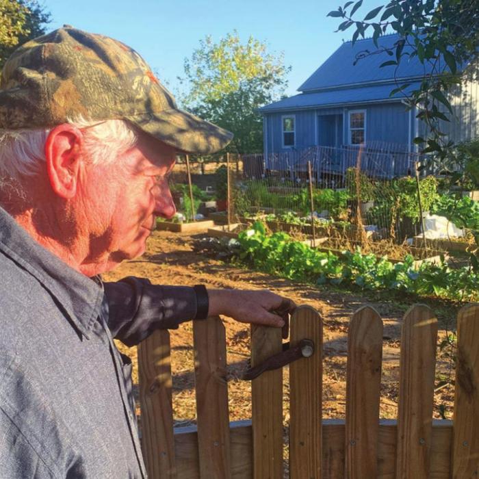 Retired Fayette County Judge Ed Janecka inspects his garden Monday afternoon, Dec. 7. Photo by Andy Behlen