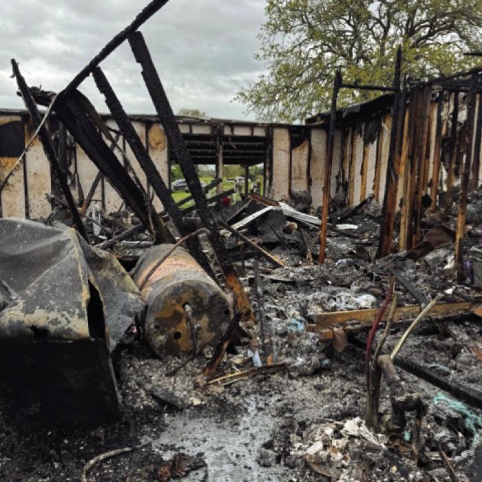 Muldoon, La Grange and Flatonia firefighters battled a house fire north of Muldoon Sunday. Photos Courtesy of the Muldoon Volunteer Fire Department