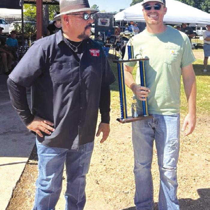 Chuck Stanley (right) won best car for his 1957 Olds sedan. He is pictured with Tony Ramirez, head Judge.