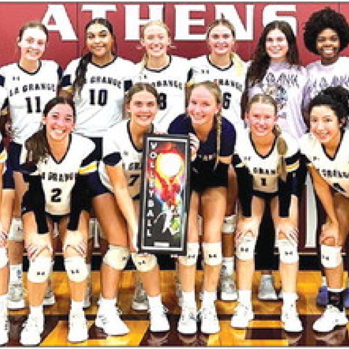 The members of the La Grange volleyball team show off their trophy for winning the Silver Bracket title at the Athens tournament over the weekend.