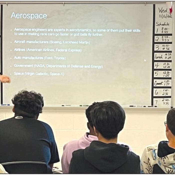 Texas A&amp;M Engineering Department board member, Tim Pylant, speaks to Kim Newton's middle school students about STEM careers on Nov. 16.