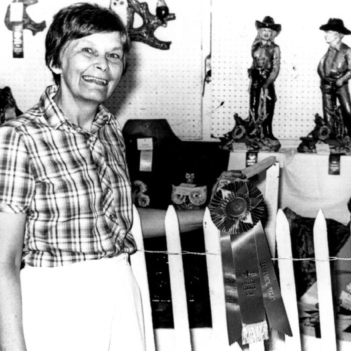 Mrs. Lee Roitsch holds her grand champion ribbon for ceramics at the Fayette County Fair. Over the years, she and many of her students took home awards locally and at the state ceramics show.