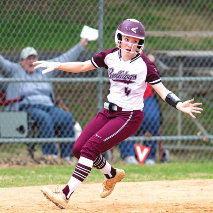 Lady Dogs Drop District Opener