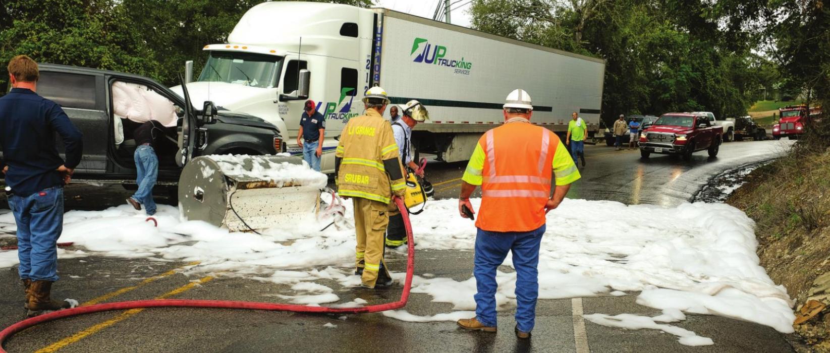 This scene of an accident on the bluff from 2019 has become an all-too-common sight on La Grange’s iconic curvy road. A bill filed in the Texas Senate might halt all big rig traffic on the road. Record file photo