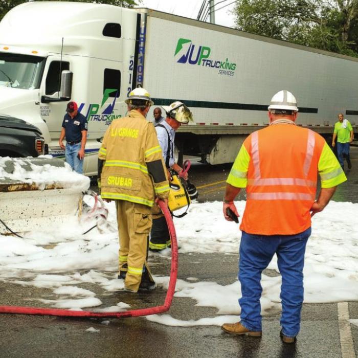 This scene of an accident on the bluff from 2019 has become an all-too-common sight on La Grange’s iconic curvy road. A bill filed in the Texas Senate might halt all big rig traffic on the road. Record file photo