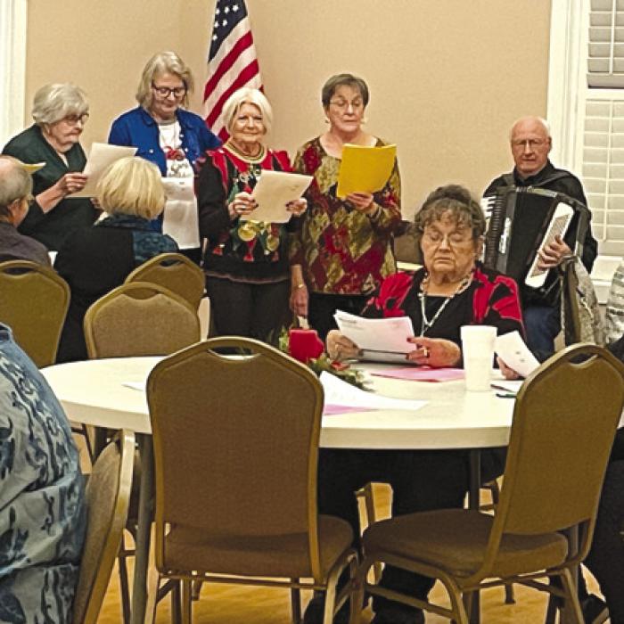 Czech Heritage Society members and guests singing Czech songs.