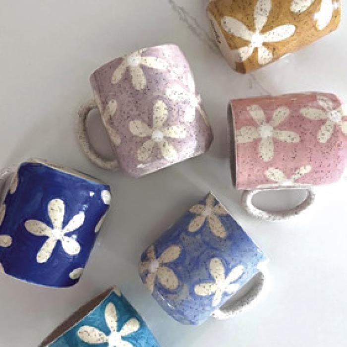 Ceramic mugs by Paige Yim.