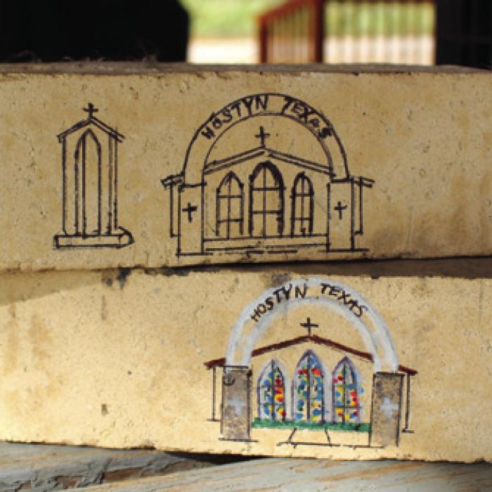Doug Janda was a huge part of was providing each of the around 200 parishioners a brick from the remains of the church. Each was stamped with a rendering of the old church, done by Janda himself.