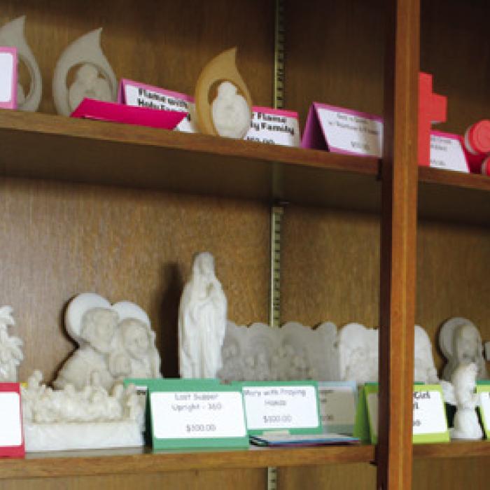 Using the powdered remains of the old altar mixed with resin, Doug Janda has created new treasures that are being sold to help pay for the rebuilding of the Hostyn church, which was destroyed by fire in 2022.