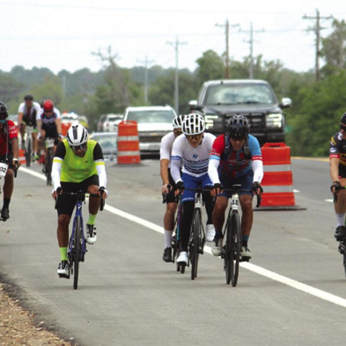 These cyclists certainly seemed to enjoy the new expended Highway 77 (still under construction) as they made their way towards the Fayette County fairgrounds Saturday afternoon. Photos by Jeff Wick