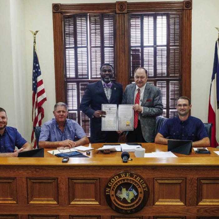 Ronnie McDonald, Prairie View A&amp;M Extension Agent for Fayette County, was on hand for the proclamation signing last Thursday. Pictured (from left) are Pct. 4 Commissioner Drew Brossmann, Pct. 3 Commissioner Harvey Berckenhoff, Ronnie McDonald, County Judge Dan Mueller, and Pct. 2 Commissioner Clint Sternadel.
