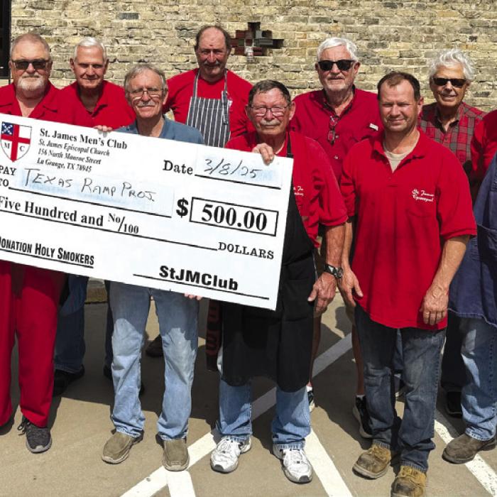 The St. James Holy Smokers recently cooked for The Texas Ramp Project. Pictured from left are Jimmy Klyng, Frank Smith (Regional Coordinator, Tri-County, Texas Ramp Project) Guy Mason, Paul Cheatham, Larry Kahanek, Chuck Gibson, Joe Bailey, Jason Krupala, Dan Boyles, and Jim Gilley.