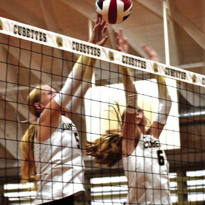 Round Top-Carmine’s Hayden Kasmiersky and Caydan Nelius jump to block a ball in Tuesday’s victory over Brazos Valley. Photo by Paul Kipp