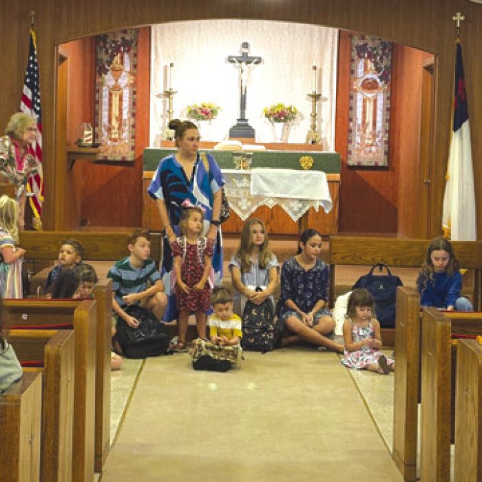 Students and teachers present at the Aug. 9 joint worship service of Shared Lutheran Ministry received a special back-toschool blessing.