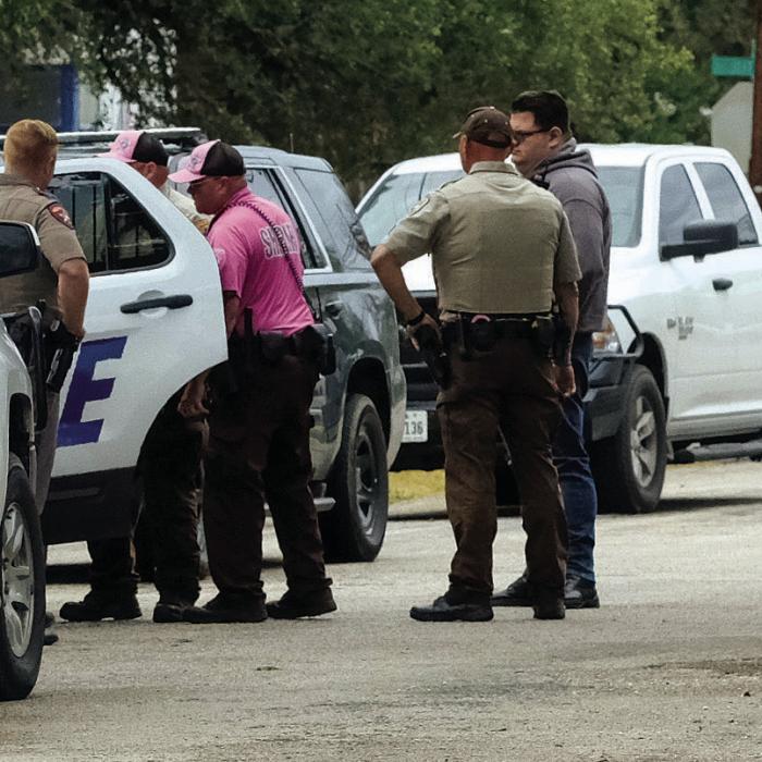 Officers from multiple agencies assisted with a search for a pair of burglary suspects in La Grange on Monday, Oct. 17. Pictured above was the scene on Pecan St. after officers apprehended one of the suspects. The suspects were released after the property owner declined to press charges. Photo by Andy Behlen