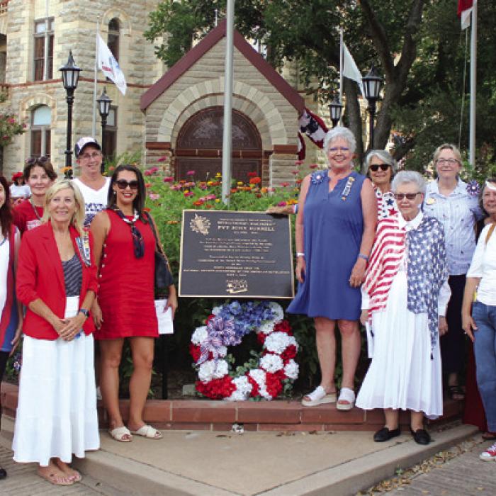 Local members of the Daughters of the American Revolution pose with the marker after it was unveiled Saturday at the Veterans Memorial on the courthouse lawn in La Grange. Photo by Jeff Wick
