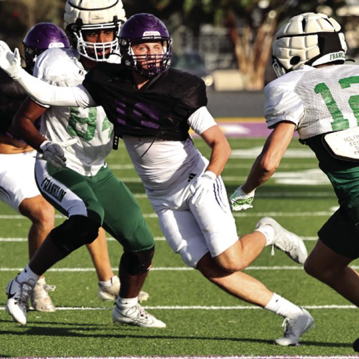 La Grange linebacker Caleb Norwood pursues a Franklin ballcarrier in Thursday’s scrimmage. Photo by Darrell D. Gest