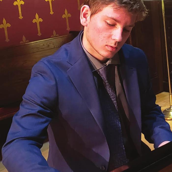Miles Gillette at the piano. Photo by Laura Gillette