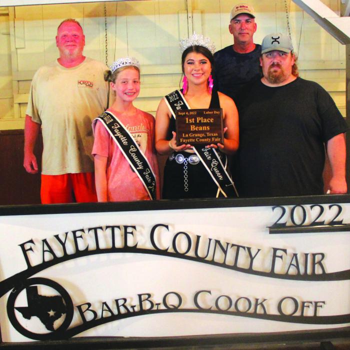 First Place Beans – The team “LTB” of College Station. Left to right: Robbie Wisdom, Fair Jr. Miss Hailey Janish, Fair Queen Teagan Branch, Mark Herdings and head cook Eric Ahlschlager.