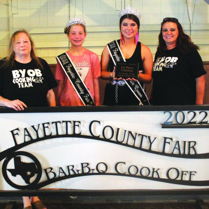 First Place Chicken – The team of “BYOB – All In” of La Grange. Left to right: Head cook Gina Adams, Fair Jr. Miss Hailey Janish, Fair Queen Teagan Branch and Andrea Combs.