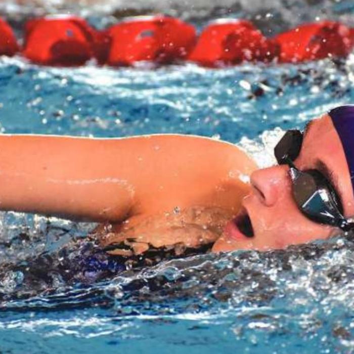 La Grange’s Morgan King swimming freestyle. Photo by David Krupala