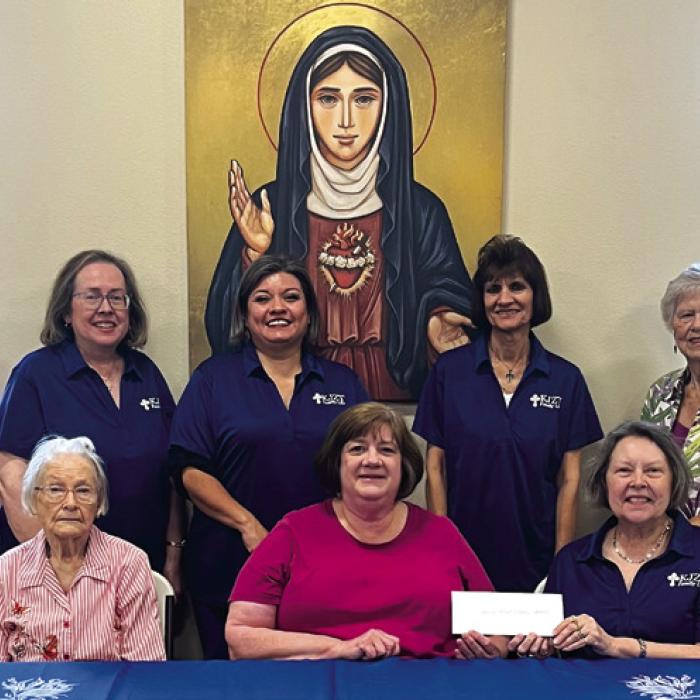 KJZT Family Life Society No. 31 members presented Sacred Heart Catholic School Principal La- Donna Voelkel a check from the KJZT State Offi ce that represented the 50% Matching funds from the plant wheel booth that Society No. 31 sponsored at the recent Sacred Heart Catholic School Spring Festival. Presenting the check on May 19 from left, standing, Phyllis Chavarria, President Elizabeth Kallus, Vice President Nicole Vasut, Treasurer Barbara Eilert, and Doris Lidiak; seated, Rose Recek, Principal LaDonna Vo