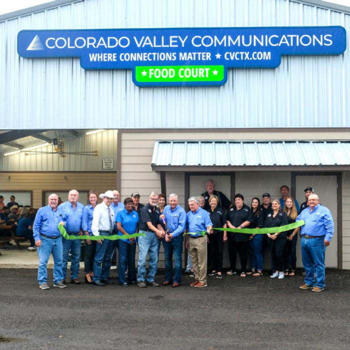 Representatives from the Fayette County Fair Association and Colorado Valley Communications, along with City of La Grange and Fayette County officials, cut the ribbon at the grand opening ceremony for the new Food Court at the Fairgrounds. Photo by Andy Behlen