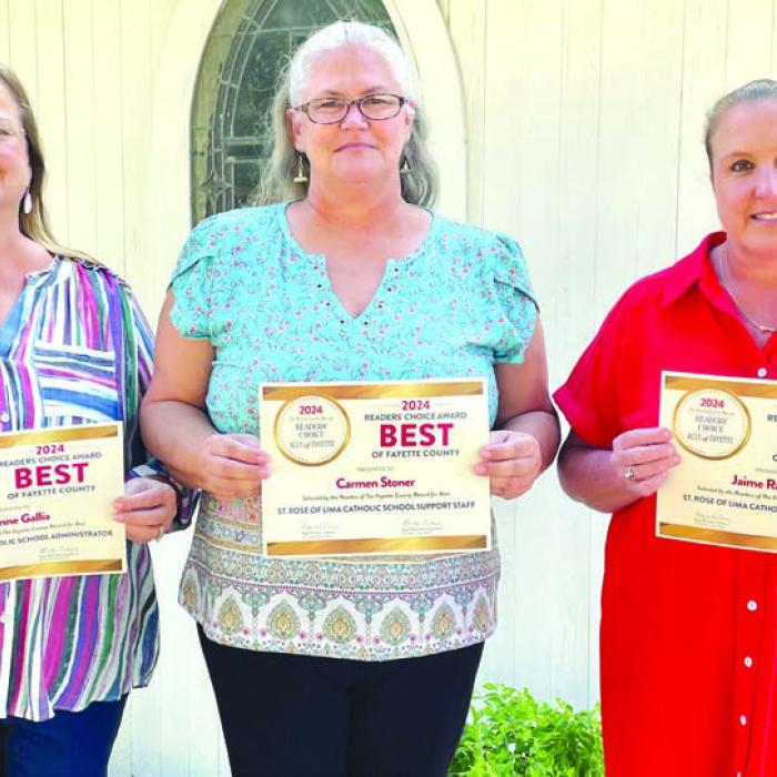 Pictured from left: Rosanne Gallia, named the best St. Rose of Lima Catholic School Administrator; Carmen Stoner, named the best St. Rose of Lima Catholic School Support Staff; and Jaime Rainosek, named the best St. Rose of Lima Catholic School Teacher.