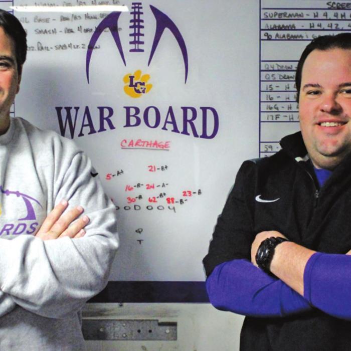 This is a photo before La Grange’s state semifinal game in 2013. La Grange head football coach Matt Kates is on the left. His younger brother Will Kates is on the right. Record file photo