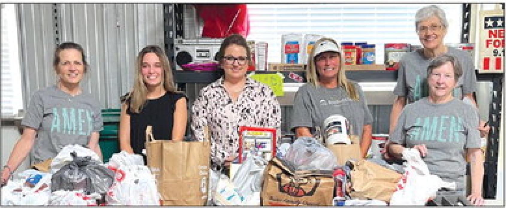 The La Grange area WoodmenLife recently donated to the AMEN Food Pantry in La Grange.