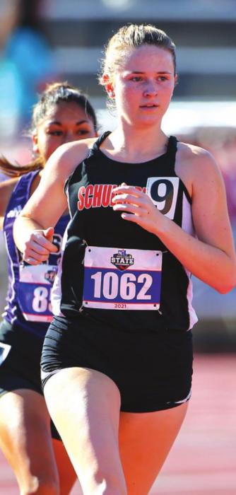 Schulenburg’s Taylor Limbaugh running in the Class 2A 1600 meters Friday. Photo by Scott Coleman