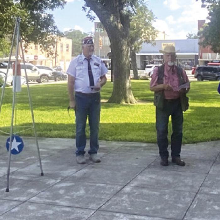 Jerry Schatte, Carolyn Caflisch, Jackie Head, Commander Richarnd Gray, John D. Marburger, Marilyn Kothmann, Elizabeth Kallus, and reading the Proclamation is the Honorable Fayette County Judge, Dan Mueller
